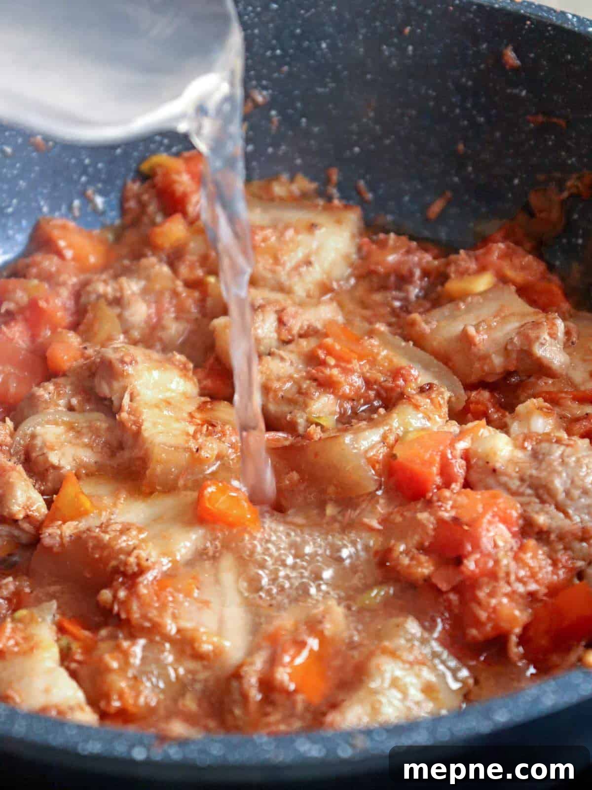 Binagoongang Talong: Eggplant in Shrimp Paste 5 adding water to sauteed pork belly in a pan