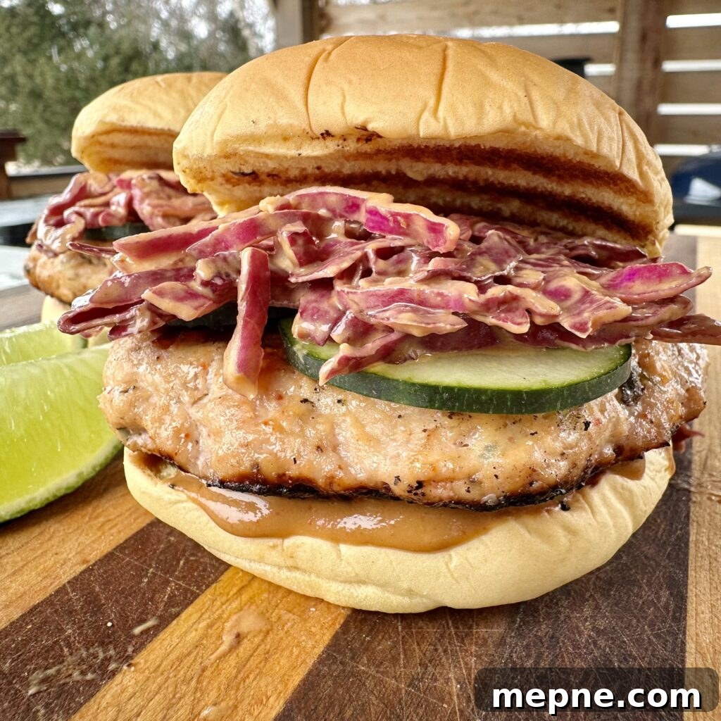 Thai Chicken Burger Recipe with Spicy Peanut Sauce 2 Thai inspired chicken burger on a bun