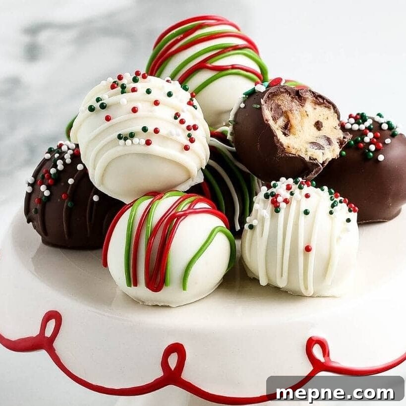 Chocolate covered cookie dough bites decorated for the holidays with text overlay.