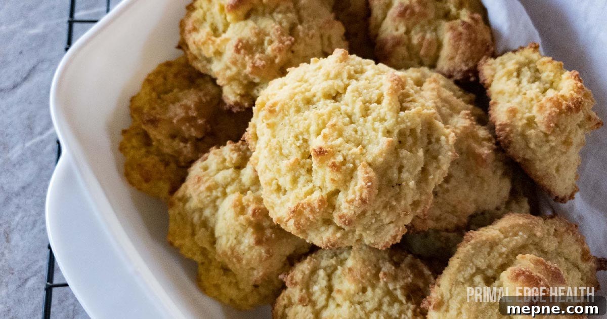 13 Low-Carb Holiday Appetizers to Impress Guests 14 Buttermilk biscuits with almond flour in white dish on cooling rack.