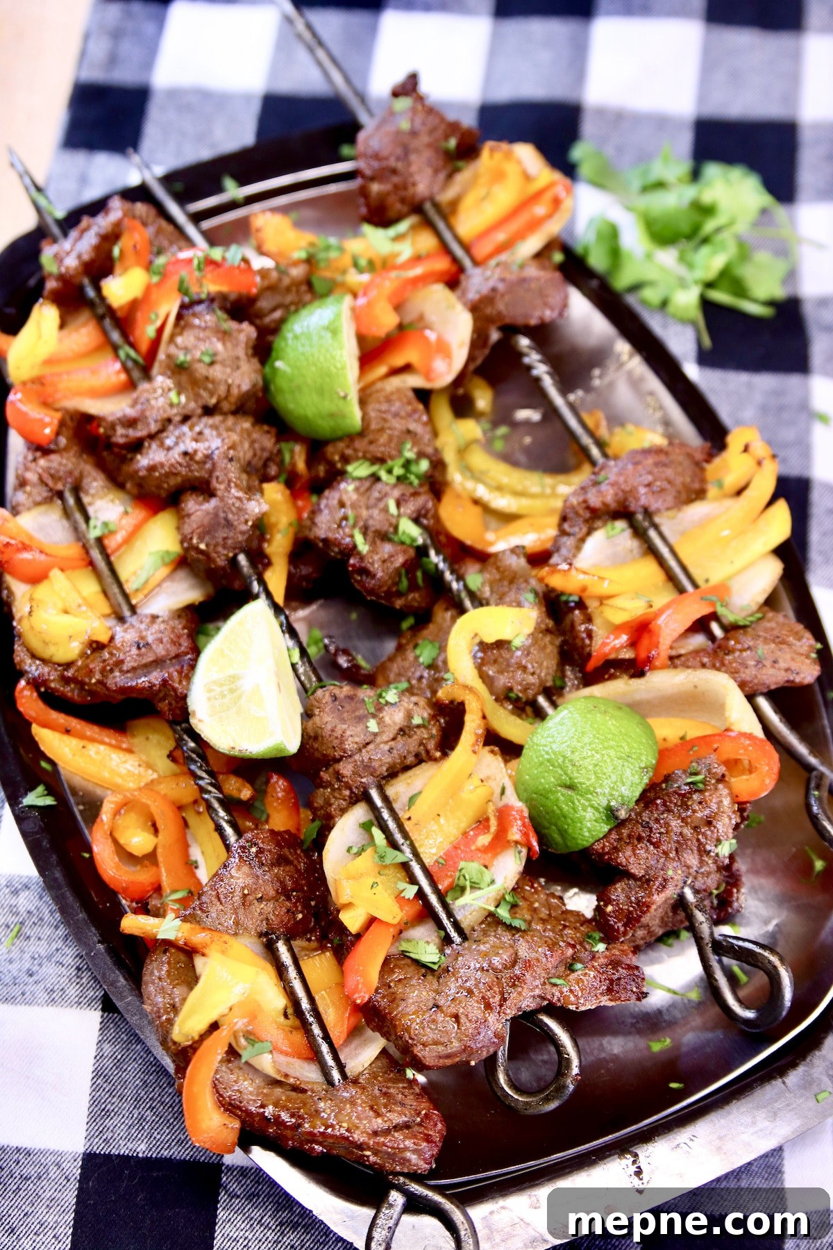 Fajita Marinated Steak Skewers on a platter.
