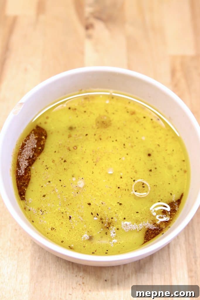Orange juice and olive oil added to fajita seasoning.