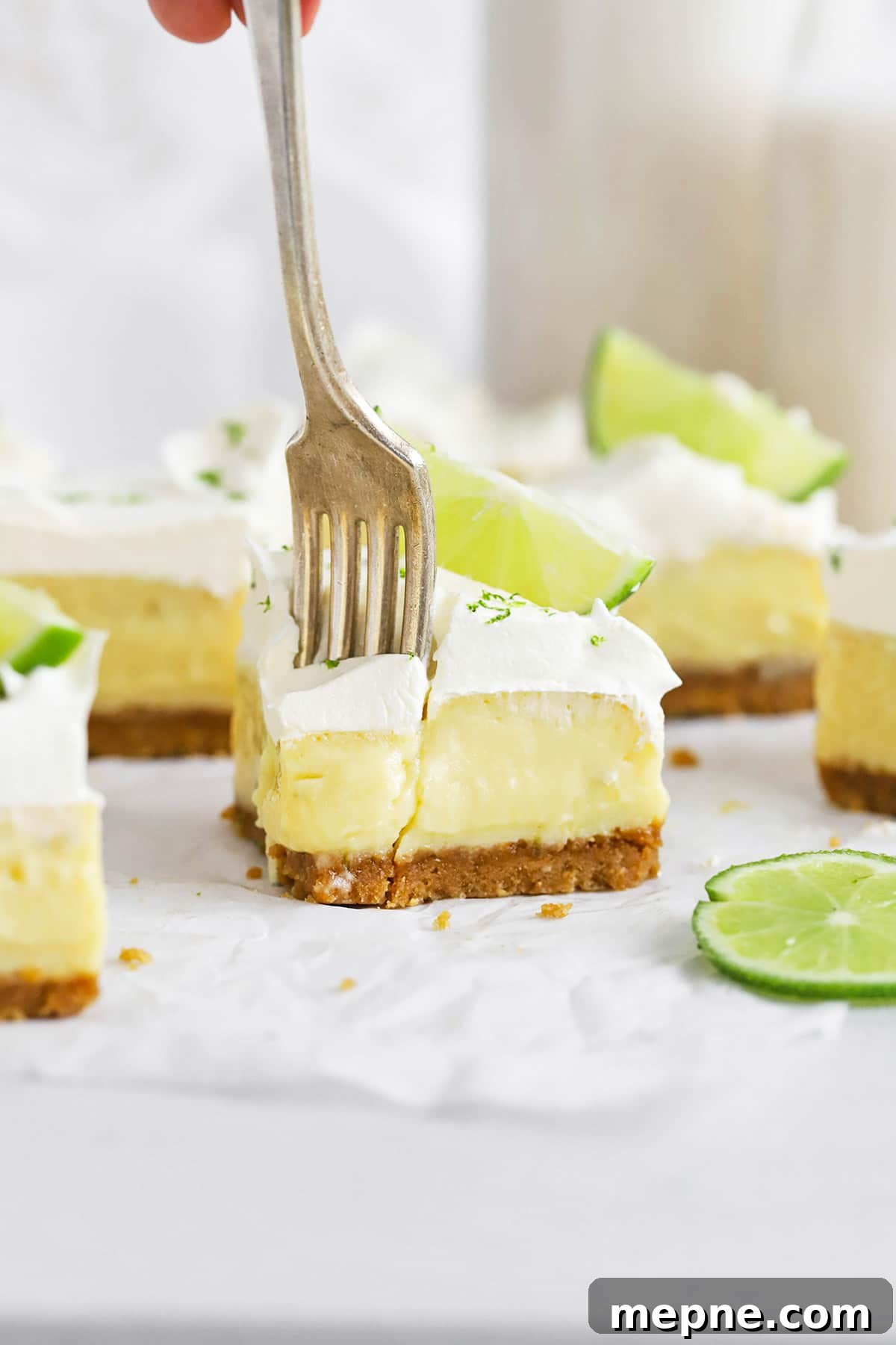 Gluten-Free Key Lime Pie Bars Recipe: Zesty Lime Squares 2 Front view of gluten-free key lime pie bars with graham cracker crust