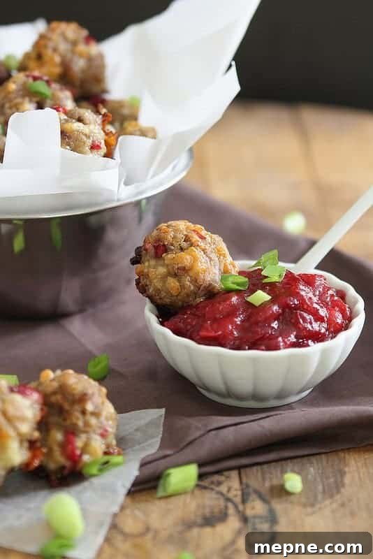 Cranberry Cheddar Sausage Bites Holiday Appetizer Recipe 2 Cranberry Cheddar Sausage Bites | runningtothekitchen.com
