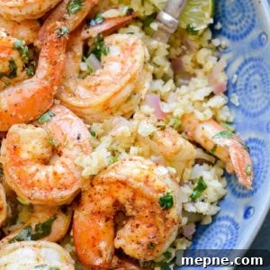 Keto Cilantro Lime Shrimp with Cauliflower Rice 7 This Cilantro Lime Shrimp and Cauliflower Rice is low calorie, low carb, keto-friendly and packed with flavor! This is a quick meal your entire family will love!