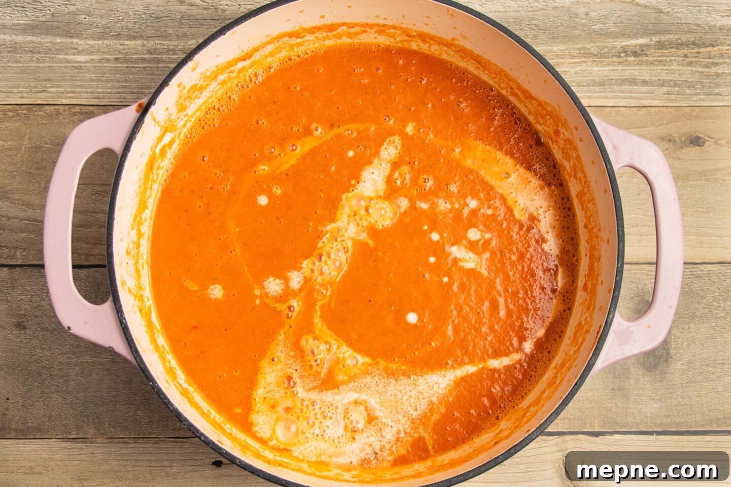 Creamy Roasted Garlic Tomato Soup Recipe 11 This is a picture of the soup blended with added cream.