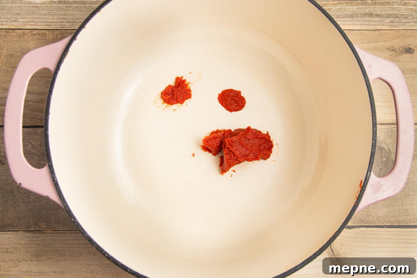 Creamy Roasted Garlic Tomato Soup Recipe 5 This is a picture of a pot with tomato paste.
