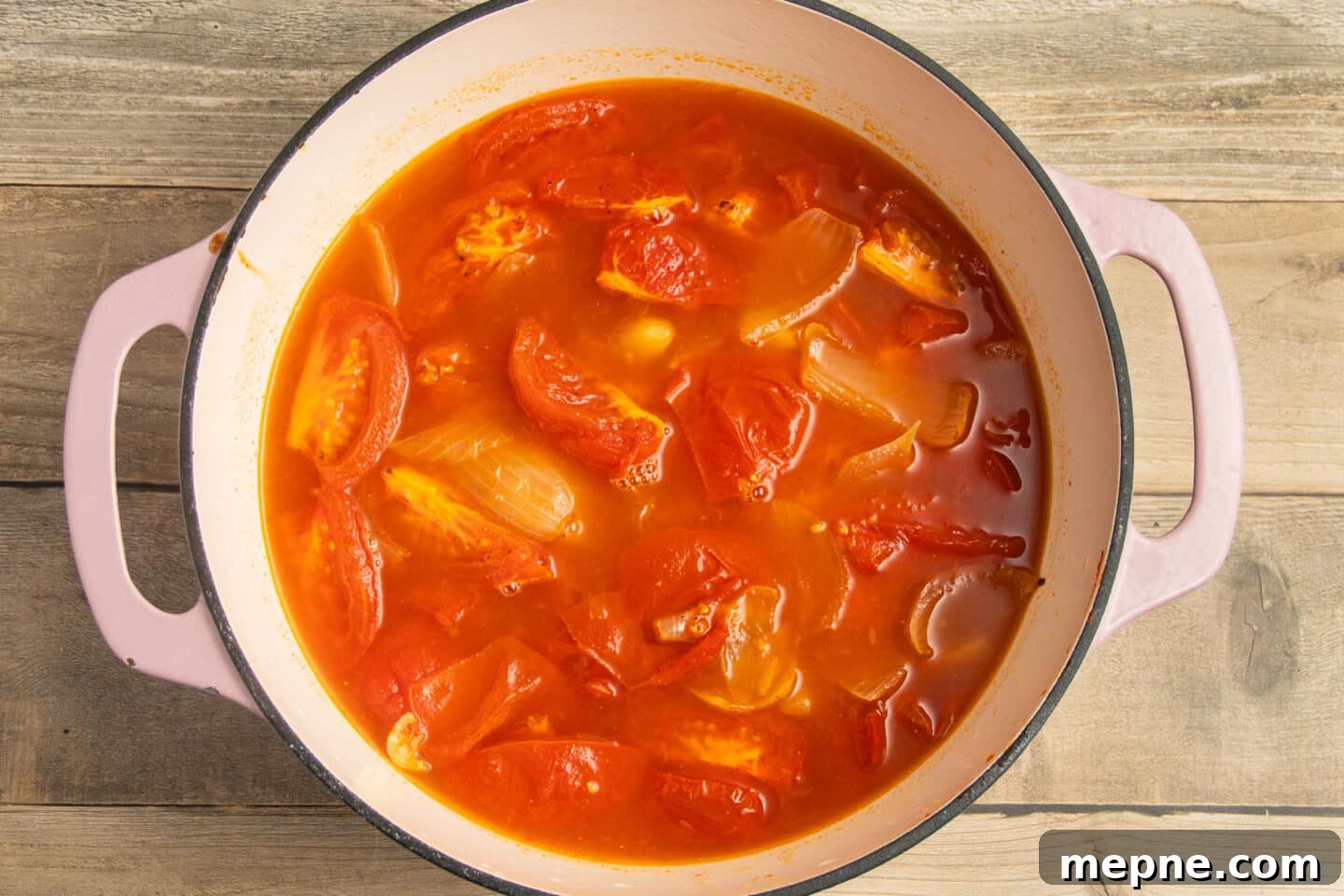 Creamy Roasted Garlic Tomato Soup Recipe 8 This is a picture of the roasted veggies added to the broth.