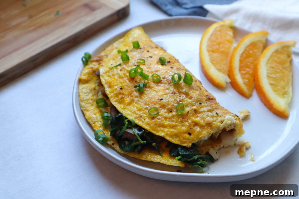 Sauteed Spinach and Mushroom Omelet Recipe 4 Cooking an omelet