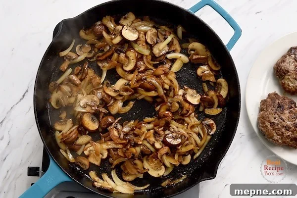 Mushrooms and onions browned in a skillet