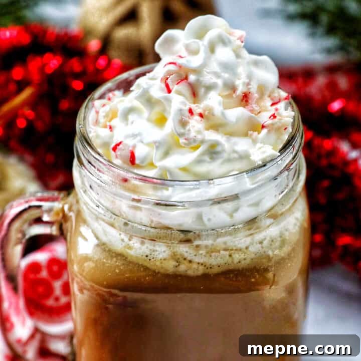 White Chocolate Peppermint Mocha Recipe 19 glass mug of white chocolate peppermint mocha with whipped cream.