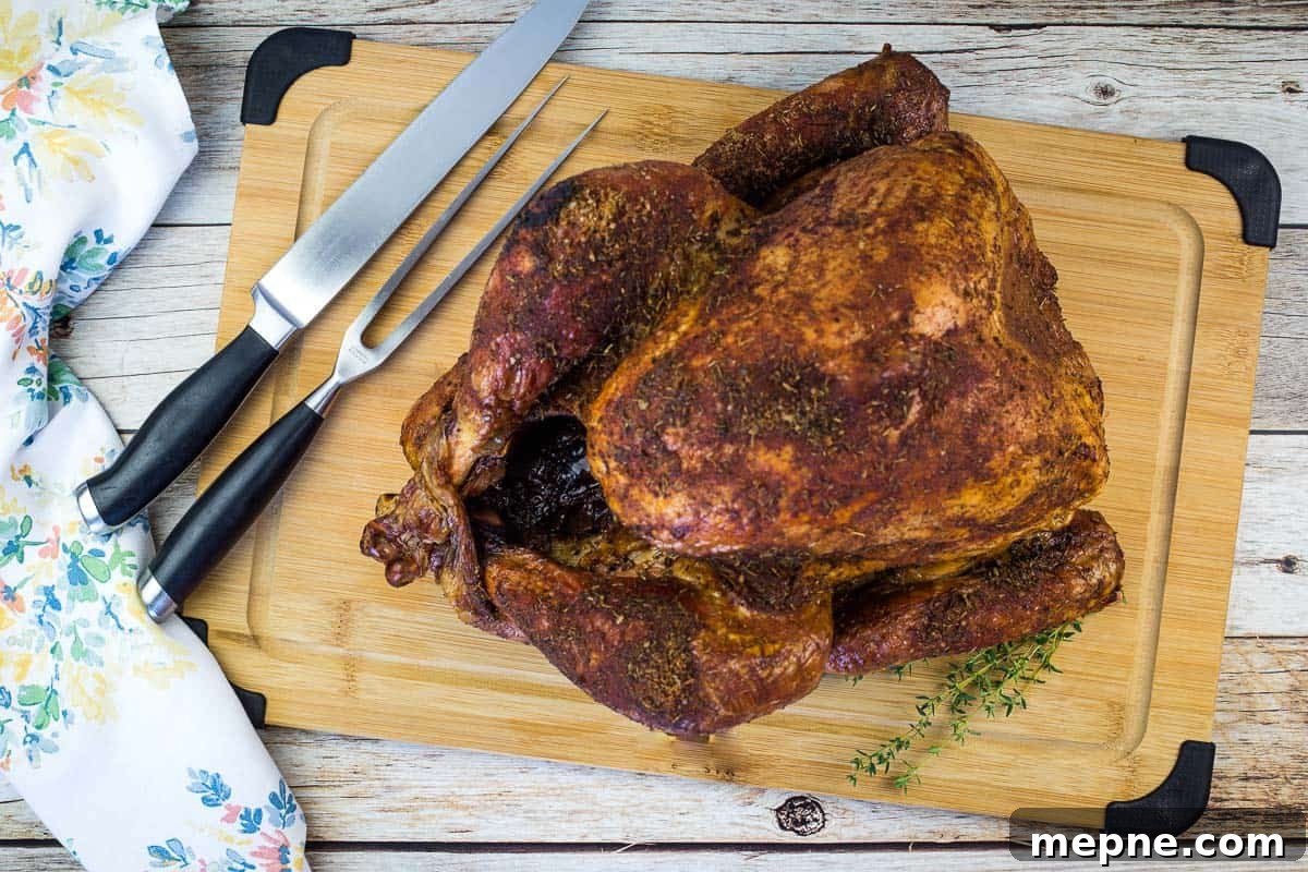33 BBQ Recipes That Turn Budget Cuts Into Gourmet Meals 25 A smoked turkey on a wooden cutting board.